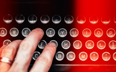 hand-touching-typewriter-keys_1